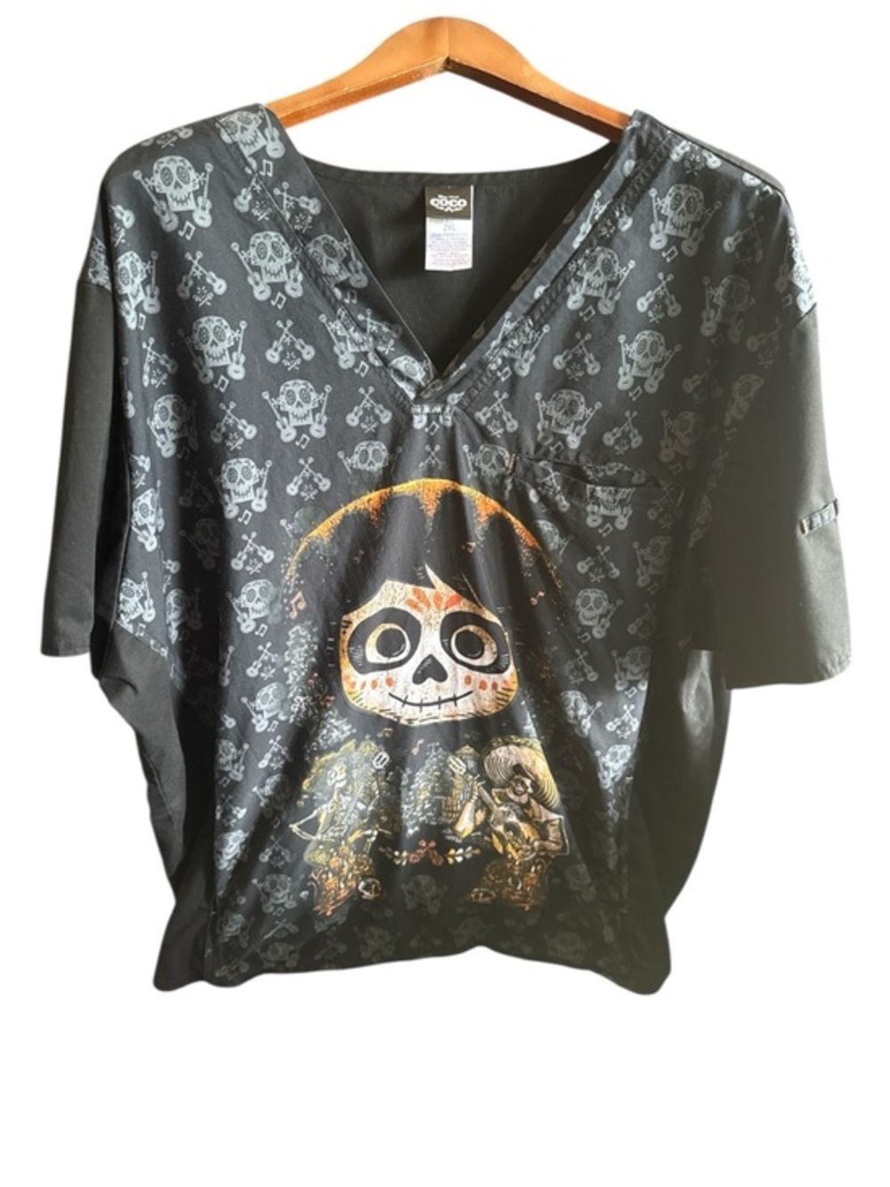 Disney’s Coco Black Skull Face Graphic V-Neck Medical Scrub Top RN Nurse Doctor